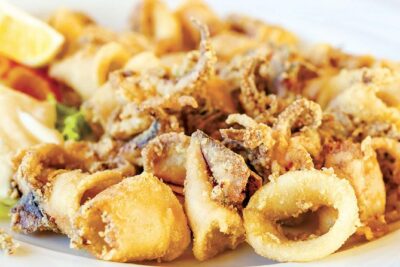 Venice: Boat Tour to Murano, Burano and Torcello with Fish Lunch - Burano and Al Raspo de Ua: A four-course seafood lunch that carries the tour
