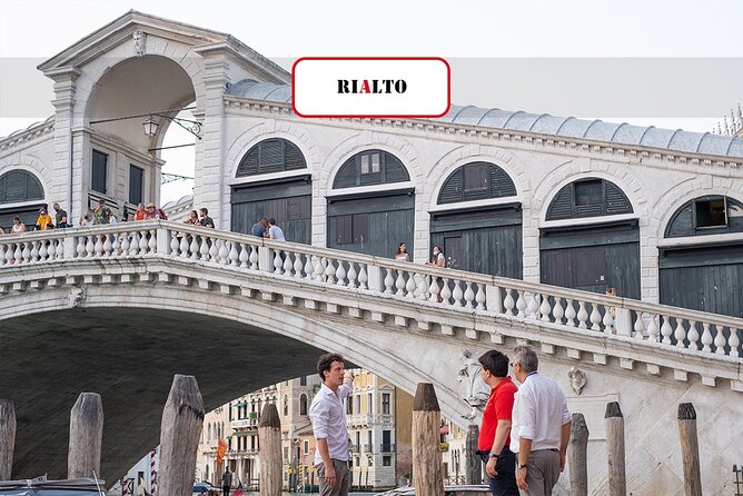 Venice: San Marco to Rialto Walking Tour & Spritz Like a Local - A white-plaque explorer stop, then a theater connection