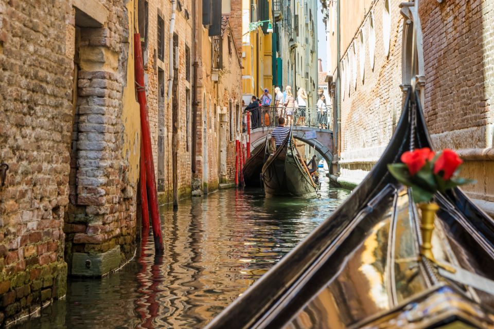 Venice: Shared Gondola Ride Across the Grand Canal - Grand Canal and the shift from side canals