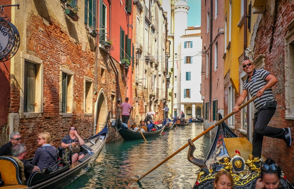 Venice: Shared Gondola Ride through the Lagoon City - La Fenice Theater and Punta della Dogana views